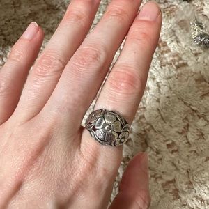 Sterling silver flower ring.